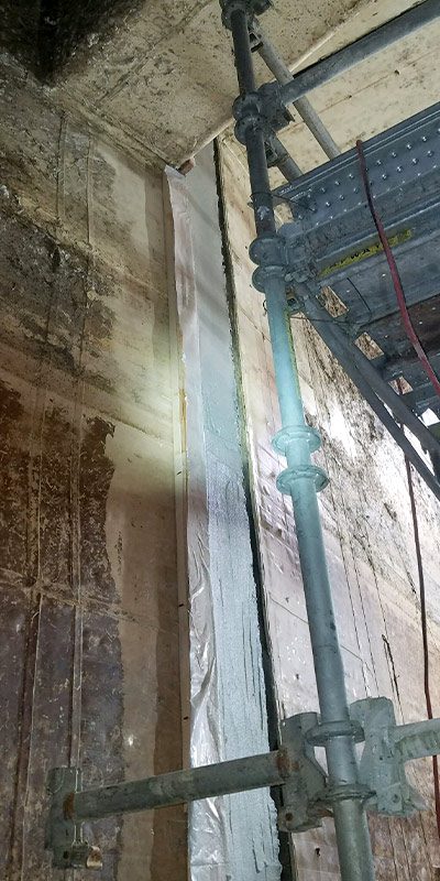 Scaffolding inside an expansion joint