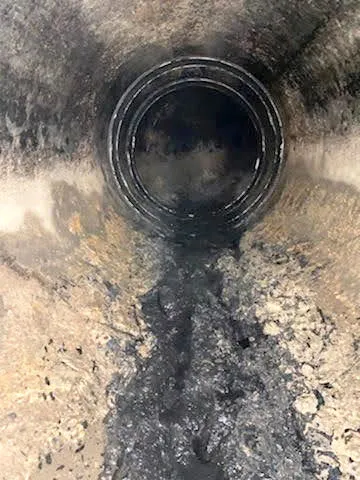 HydraTite installed over joints in a dirty waste water pipe