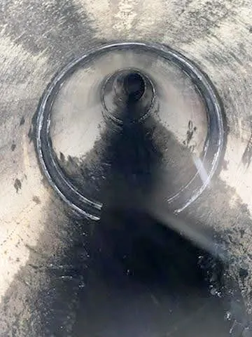 HydraTite installed over joints in a dirty waste water pipe