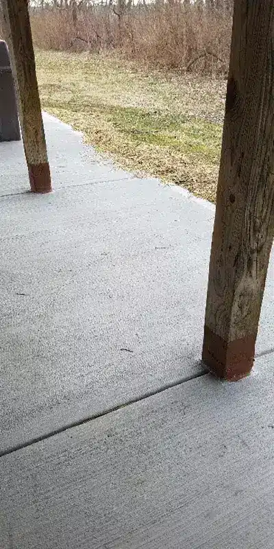 Wooden posts that have been wrapped in HydraWrap