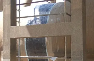 HydraWrap reinforcing the exterior of a joint in a. large cooling water pipe