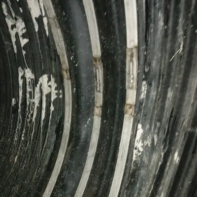 HydraTite the internal pipe joint seal installed over a joint in a corrugated metal pipe