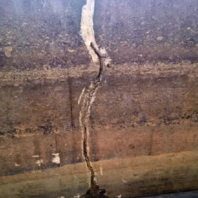 A crack running through a cooling tower basin's wall