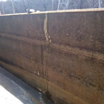 A crack running through a cooling tower basin's wall