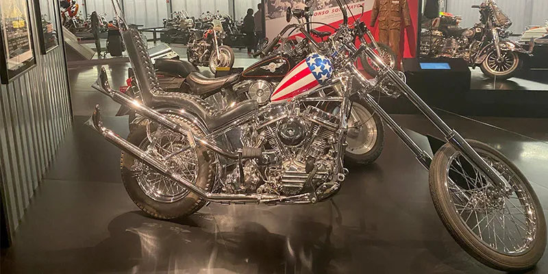 A patriotic motorcycle with an American flag painted on the side
