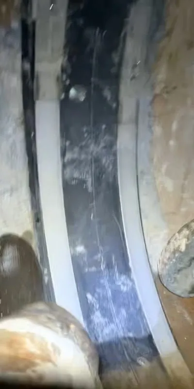 A HydraTite seal installed over a joint in a pipe to protect against leaks