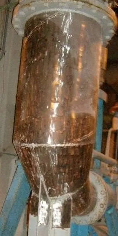 A reducing elbow pipe that has had its surface prepared for a repair by grinding