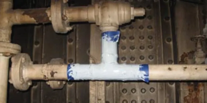 A tee fitting that has been coated in an epoxy