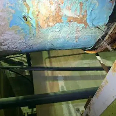 Pinholes in a 18" FRP pipe at a municipal pump station