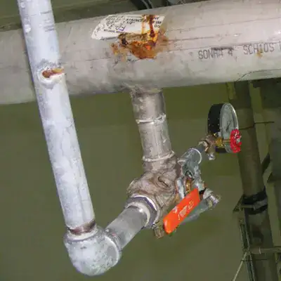 Old compromised pipe with a leak