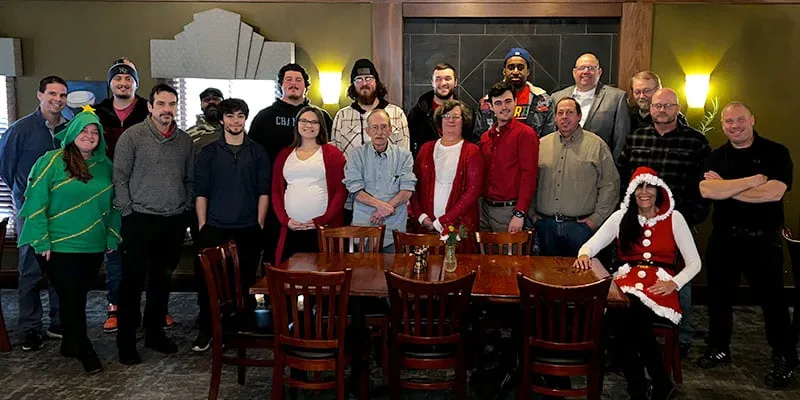A group of employees gathering for the yearly Christmas lunch