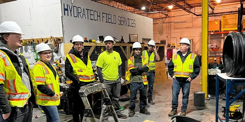 A group of field services personnel preparing for training