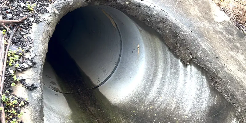 The opening of a culvert under a road