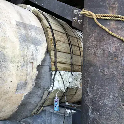 A temporary repair applied to a sanitary pipe