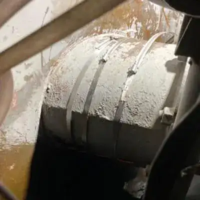 A temporary repair applied to a leaking steel pipe