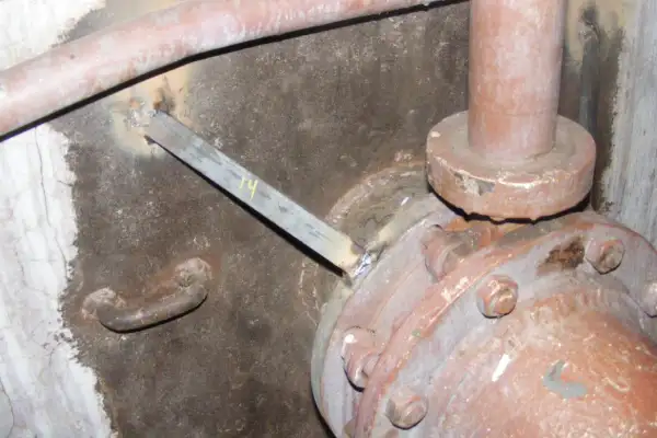 Bulkhead penetration point that has been ground clean, in preparation for a HydraWrap application
