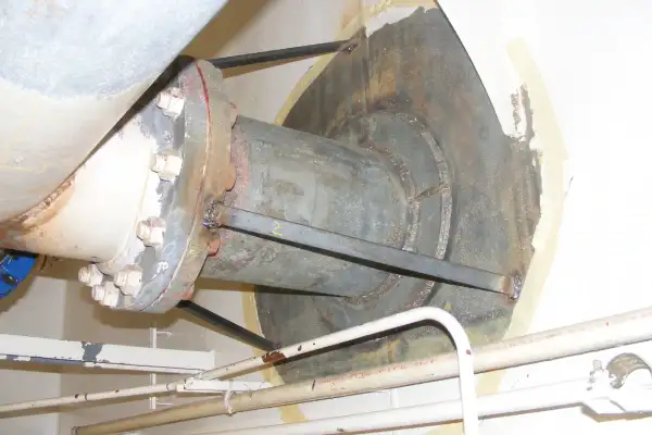 Bulkhead penetration point that has been ground clean, in preparation for a HydraWrap application