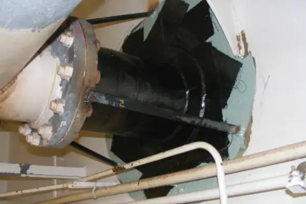 Bulkhead penetration point that has been reinforced with HydraWrap, the structurally composite repair system
