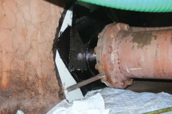 Bulkhead penetration point that has been reinforced with HydraWrap, the structurally composite repair system
