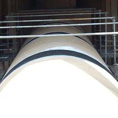 Multiple joints of a large circulating cooling water line wrapped in HydraWrap