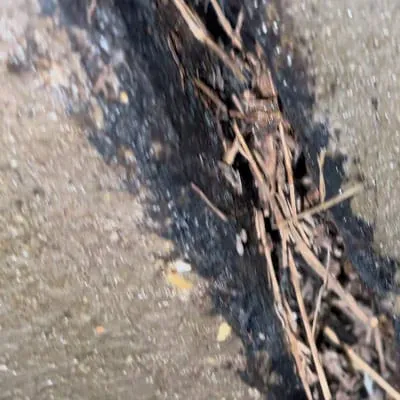 A pipe joint that is allowing debris to enter the pipe