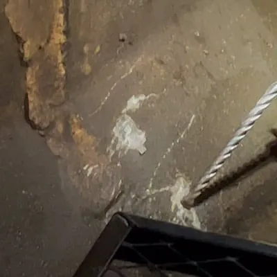 A box-culvert wall being drilled so that anchors can be inserted