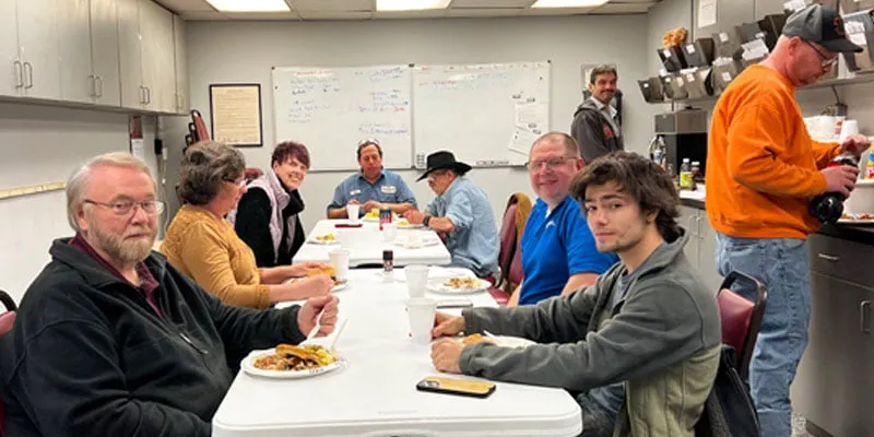 HydraTech employees sitting at lunch together