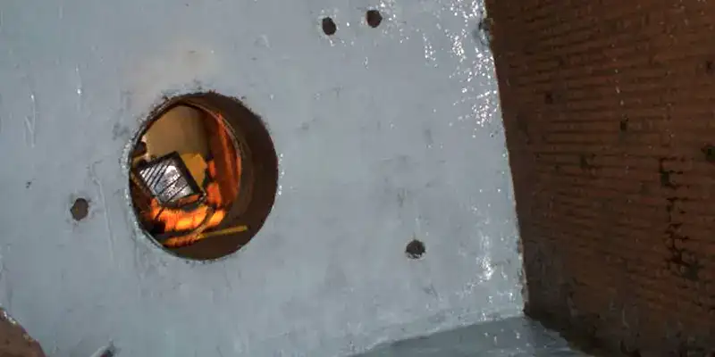 Interior of a condenser box that has been coated in epoxy