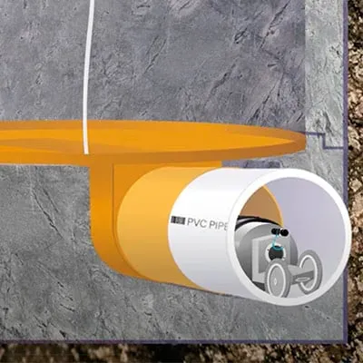 A mechanical packer inside a pipe being used to install HydraLock over a connection point