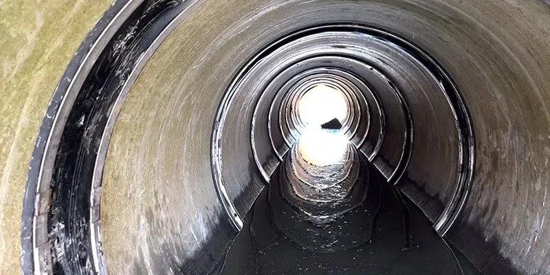 HydraTite installed over joints in a concrete pipe that has active flow