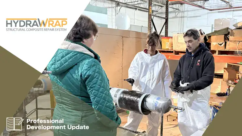 Several people applying a HydraWrap demo