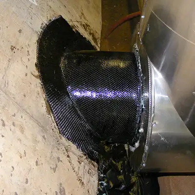 A portion of cast-iron pipe restored with HydraWrap