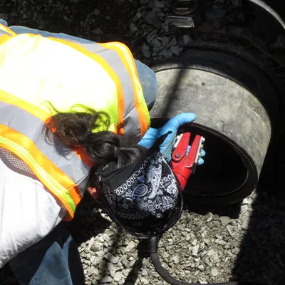 HydraTite being installed with a hydraulic expander over a liner at the end of a pipe
