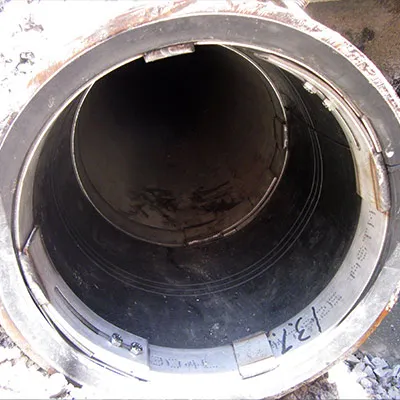 HydraTite installed at the end of a pipe locking down a liner