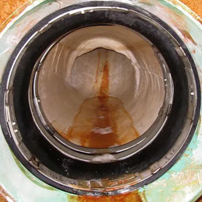 HydraTite installed at the end of a pipe locking down a liner