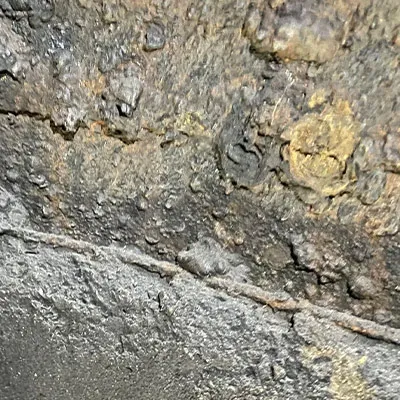 Interior surface of a riser at a hydroelectric power plant