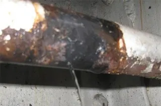 Active leak in a condensate pipe onboard a ship