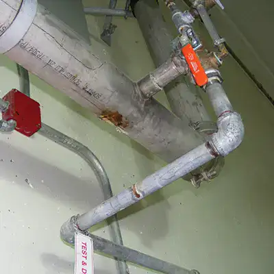 Old compromised pipe with a leak