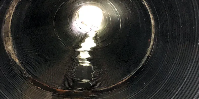 An offset joint in a corrugated metal pipe
