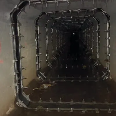 A long dark box-shaped culvert that has had the joints sealed with HydraTite internal pipe joint seals