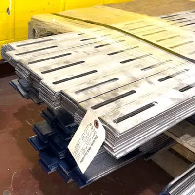 Pieces of steel with slots cut into them