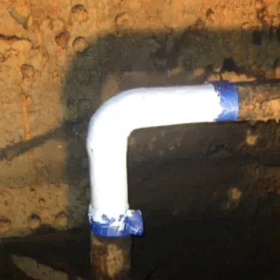 An elbow pipe that has been coated in an epoxy