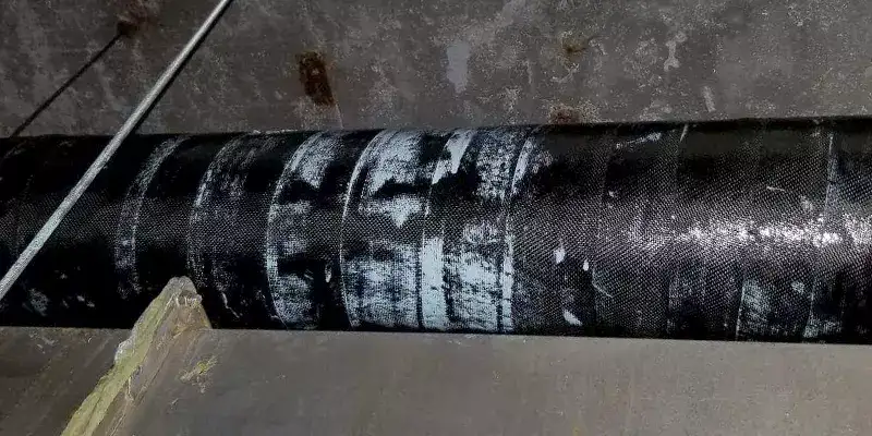 A gas main that has been fortified with HydraWrap