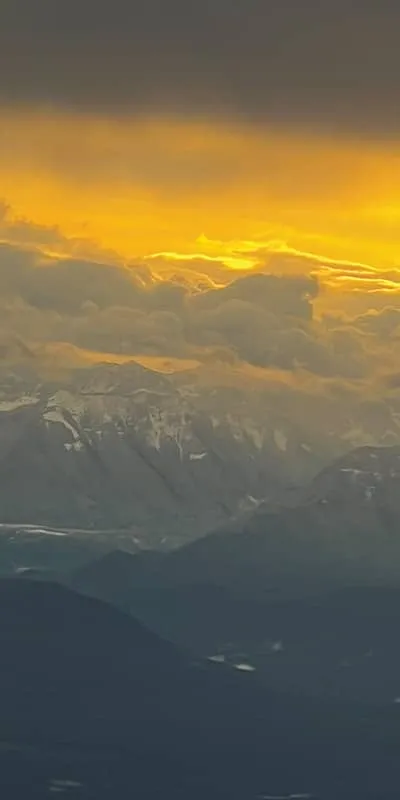 An orange sunset over a mountain