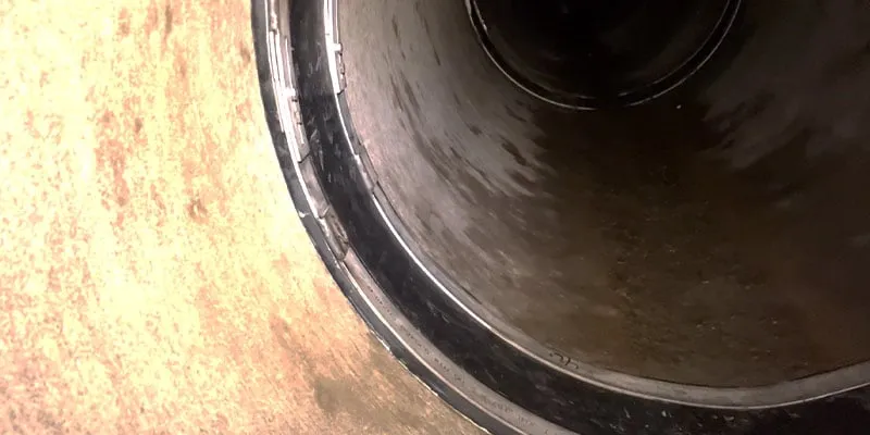 Two HydraTite internal pipe joint seals that are fortifying two joints, sealing them from the inside