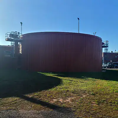 A wastewater facility with a corroded vertical digester mixing pipe