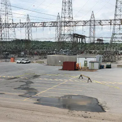 A parking lot with a puddle of water