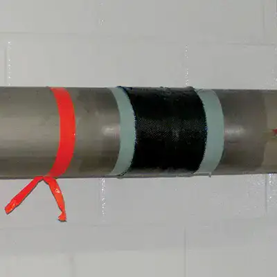 A HydraWrap weld kit repair applied to a limited area on a pipe