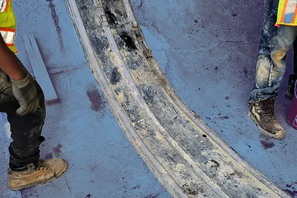 A large HydraTite seal installed over a joint in a big pipe, preventing leaks