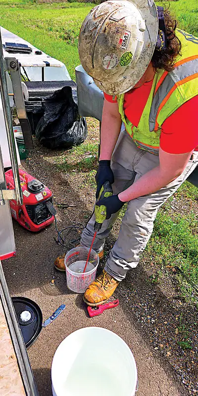 A field technician missing epoxy for a fiber wrap application